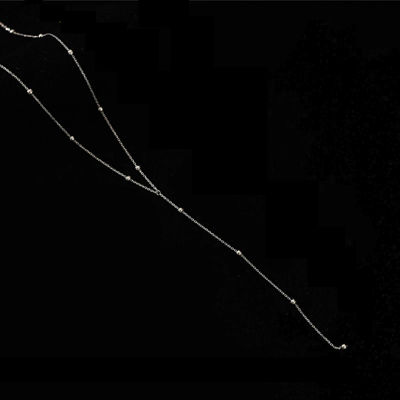 Kilpikalsikaulanauha tupsuilla